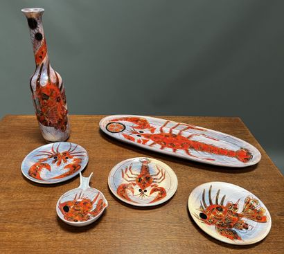 null * VALLAURIS 

Lot including fish dish with a lobster, pan, three plates and...