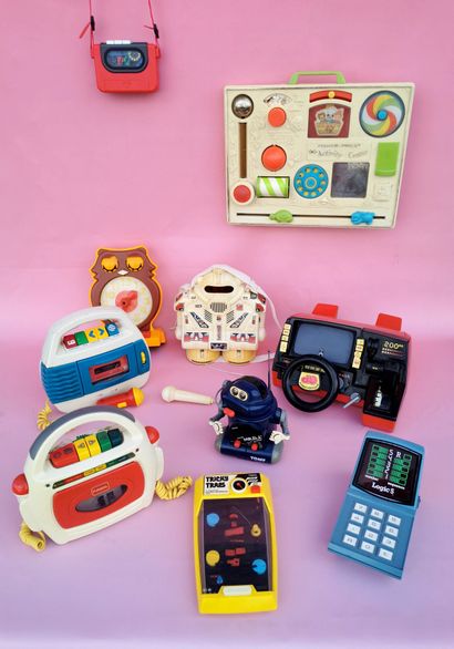 null Plastic toy set from the 1980s and 1990s, including: 

Two karaoke cassettes...