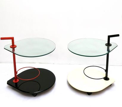 null Work from the 1990's

Two low tables on wheels, top forming a water drop 

Lacquered...