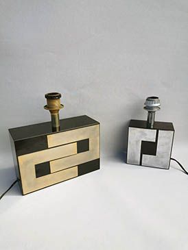 null Attribuée à Philippe JEAN (1931 - 1987)

Deux lampes en bois laqué et métal...