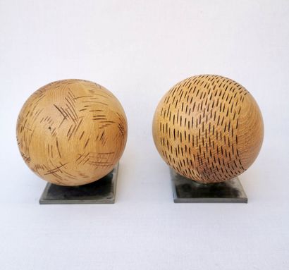 null DJACK, Jacques Demortier (born 1960)

Pair of spherical sculptures in wood resting...