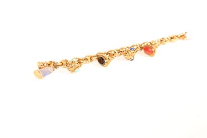 null Bracelet in 18K yellow gold 750/000 decorated with five cachet pendants, amulets,...
