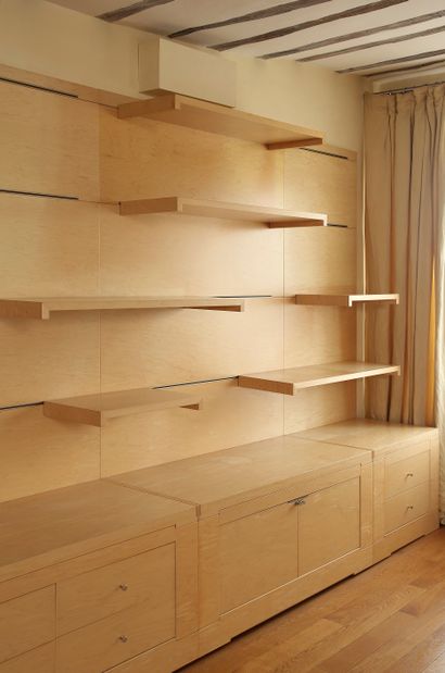 null Bookcase in maple, the upper part comprising a bottom with removable shelves,...