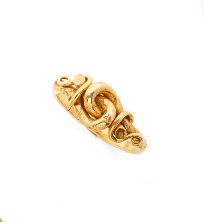 null Bracelet jonc semi articulé en or jaune 18K 750/000 à décor végétal libre et...