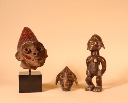 null Nigeria 
Une statuette de style mumuye dite lagalagana en bois et une tête de...