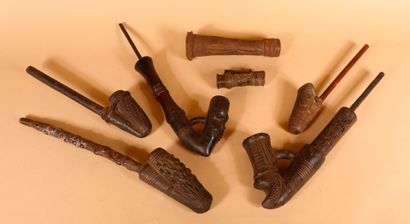 null Lot of various pipes and elements of pipe in wood, metal and terra cotta
L....