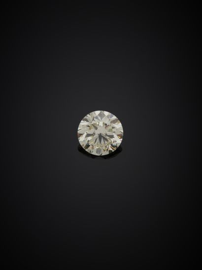 null Bague jonc plat en or gris 18K 750‰, parée d’un diamant de taille brillant monté...