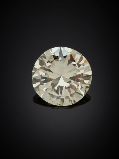 null Solitaire en or gris 18K 750‰, paré d’un diamant brillanté pesant 26,21 carats,...
