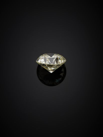 null Bague jonc plat en or gris 18K 750‰, parée d’un diamant de taille brillant monté...