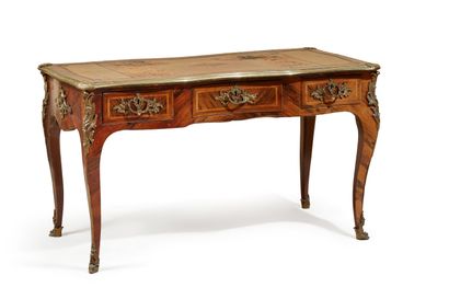 null Rosewood and rosewood framed flat desk, with three drawers in the waistband...