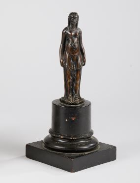 null Egyptian woman in brown patina bronze resting on a blackened wood column 
Late...