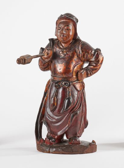 null VIETNAM - 19th century
Red and gold lacquered wooden guardian, standing, wearing...