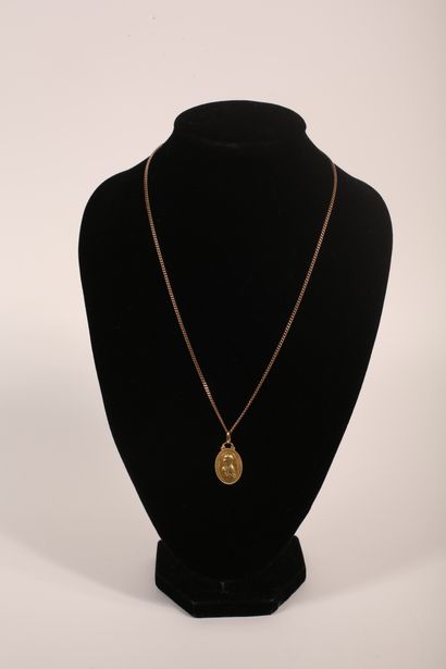 18K yellow gold 750‰ chain, curb chain link.
Attached...