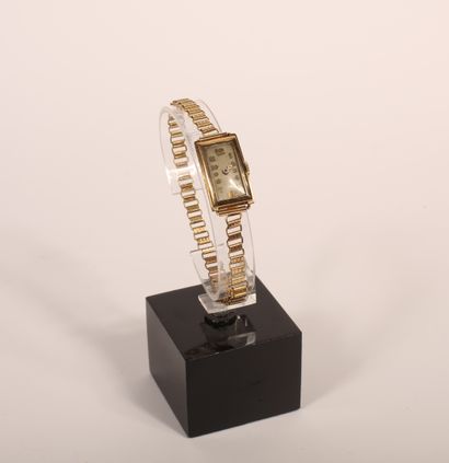 Bracelet watch, the case in 18K yellow gold...