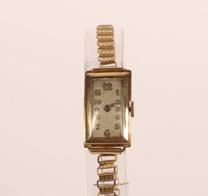 null Bracelet watch, the case in 18K yellow gold 750‰, metal bracelet. 
Gross weight:...