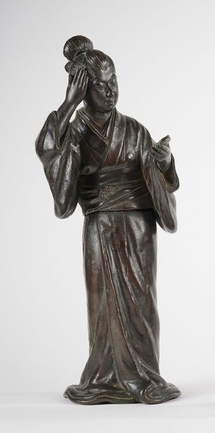 JAPON - Début XXe siècle
Statuette en bronze...
