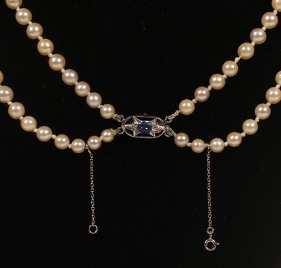 null Necklace featuring two strands of drop cultured pearls mounted on wire, oval-shaped...