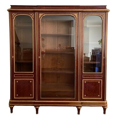 null Mahogany and gilt bronze display case with three glass doors 
Louis XVI style...