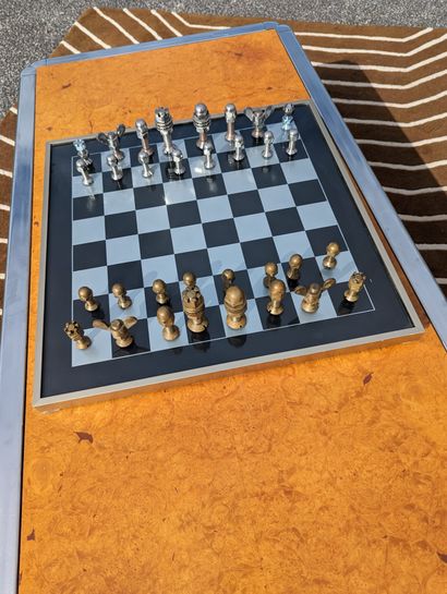null Aluminum glass chessboard and "visserie" counters 
Bears a CLE Flash Paris label...