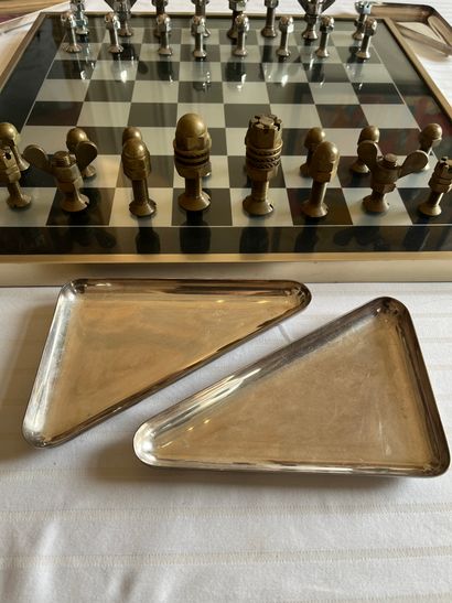 null Aluminum glass chessboard and "visserie" counters 
Bears a CLE Flash Paris label...
