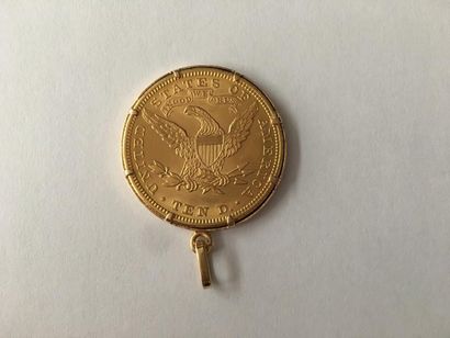 null 1 x 10 DOLLARS, 1881.
Montée en pendentif en or jaune 18K (750 millièmes).
Poids...