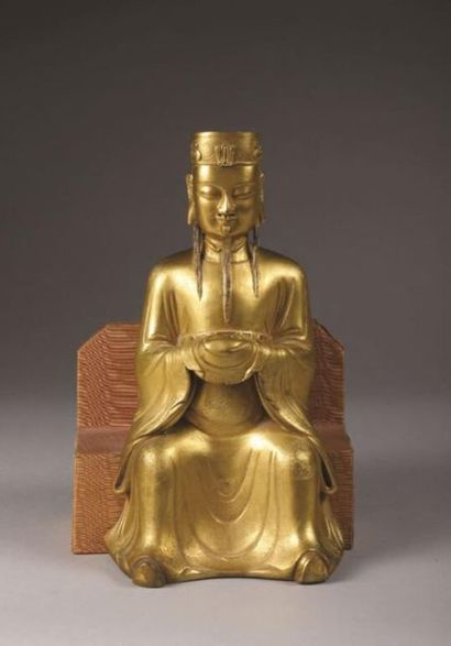 CHINE - XIXe siècle. CHINE - XIXe siècle. Mandarin en bronze ciselé et doré. (Manques...
