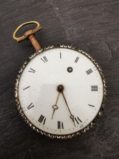 MONTRE DE POCHE Gilded metal pocket watch, the bezel entirely set with imitation...