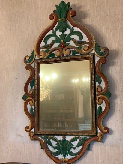 null Modern ITALIAN MIRROR made of polychrome wood and carved with interlacing foliage...