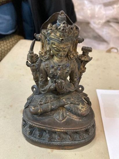 null BODHITSATTVA in cuprous metal sitting as a tailor on a lotus flower base.
Formerly...