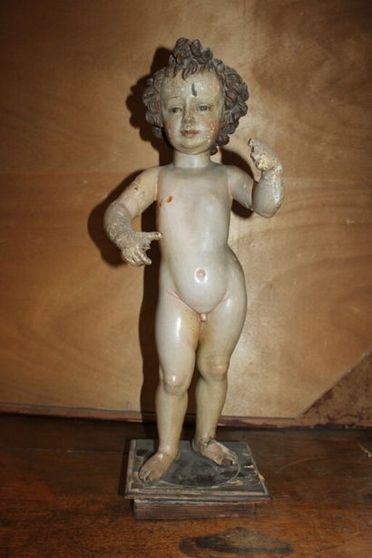 null * Ecole ibérique du XVIIIe siècle

Christ enfant. 

Sculpture en bois peint...
