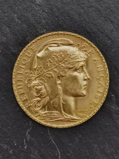 null 20 francs gold 900 mm 1910, weighing 6.45 g.