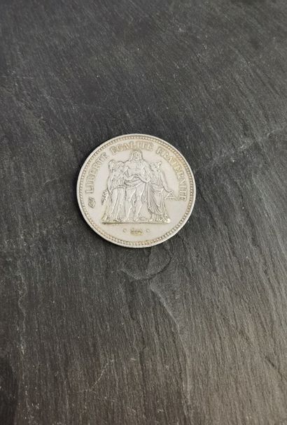 null Silver 5FF coin, 1975.

Weight: 29.9 g
