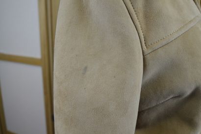 null PAUL & JOE

Manteau à capuche en peau lainé beige

T36

Quelques taches