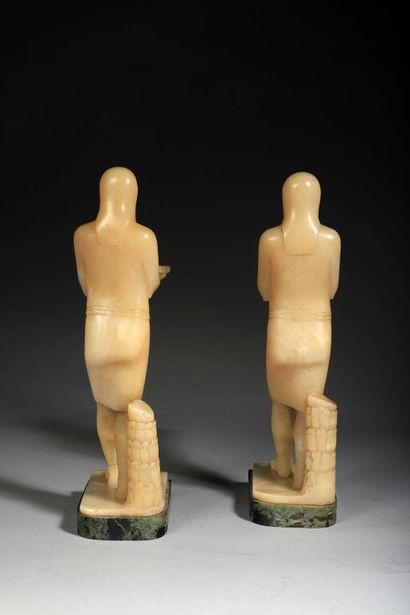 null PAIR OF STATUTES in white onyx from Algeria depicting Osiris-Antinous, flanked...