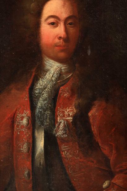 null École FRANÇAISE vers 1720.

Portrait d'homme en habit rouge.

Huile sur toile.

Cadre...