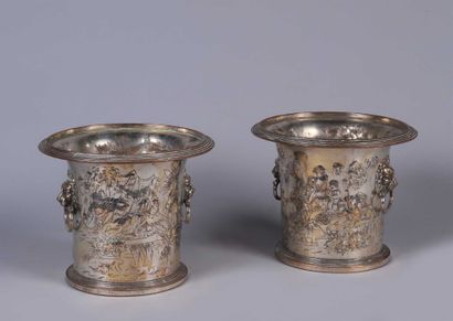 null Pair of metal refreshers decorated in relief with animated scenes and coats...