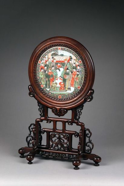 null CHINA.

A scholar's screen composed of a circular porcelain plate with polychrome...