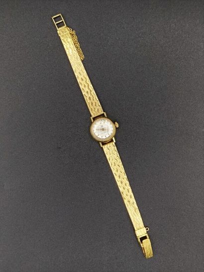 null MONTRE de dame en or jaune (750/1000e) pesant NET : 20,7 g ; brut : 24 g.