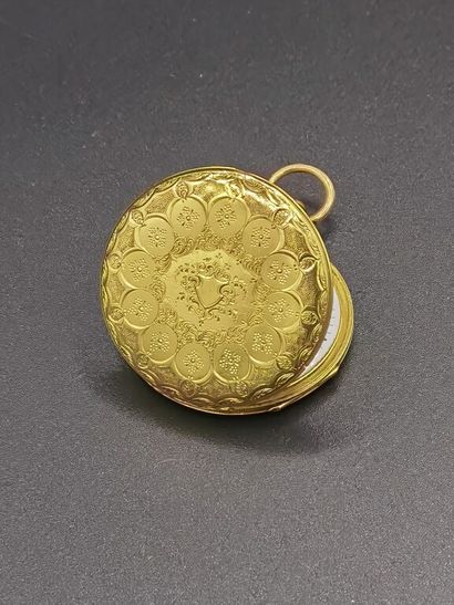 null MONTRE de poche ultraplate en or jaune (750/1000e) à décors ciselés de rosaces...