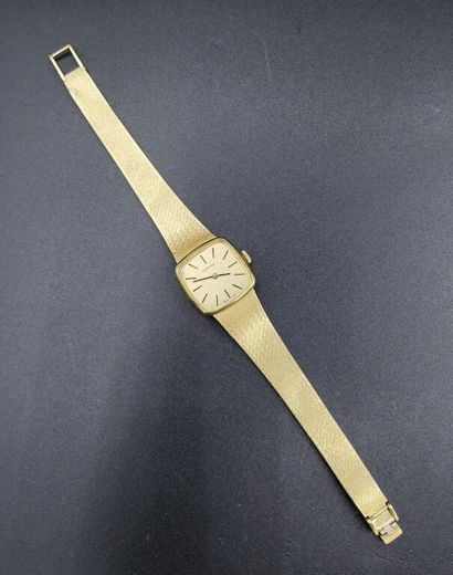 Lady's watch in 18K gold (750 thousandths),...