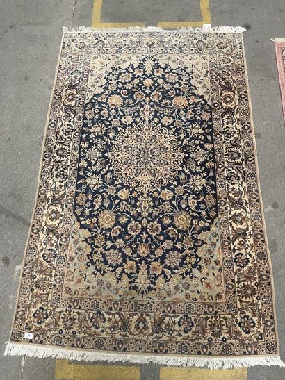 Wool and silk carpet with polychrome decoration...