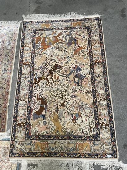 Wool and silk carpet with polychrome decoration...