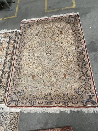 Silk carpet with polychrome decoration on...