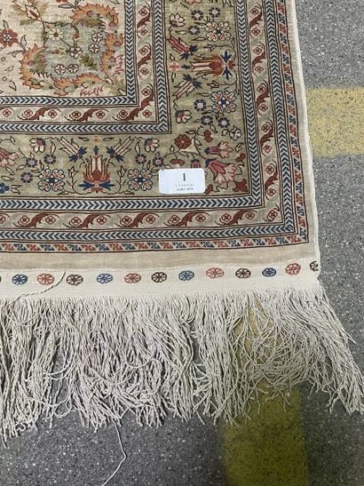 null Small prayer rug with polychrome decoration of floral motifs on an off-white...