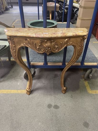 null Lot including : 

- Two consoles, one of which is a gilded wood corner console...