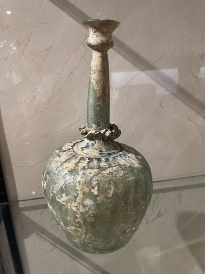Bottle whose pear-shaped body decorated with...