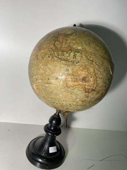 null Globe in plaster covered with a lithography posing on a support in blackened...