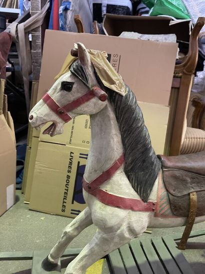 null Rocking horse in polychrome wood, saddle in leather and boiled cardboard, tail...