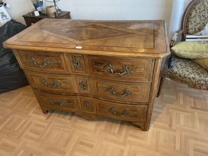 Chest of drawers with a moving front in veneer...