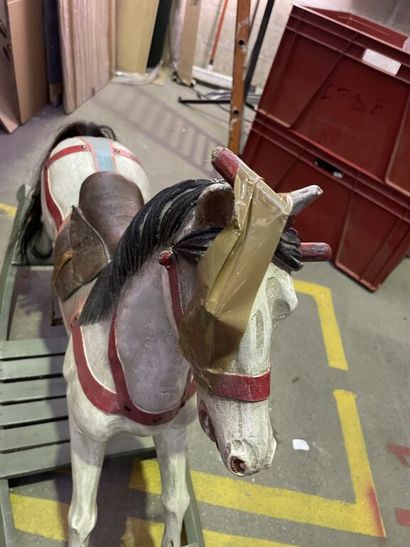 null Rocking horse in polychrome wood, saddle in leather and boiled cardboard, tail...